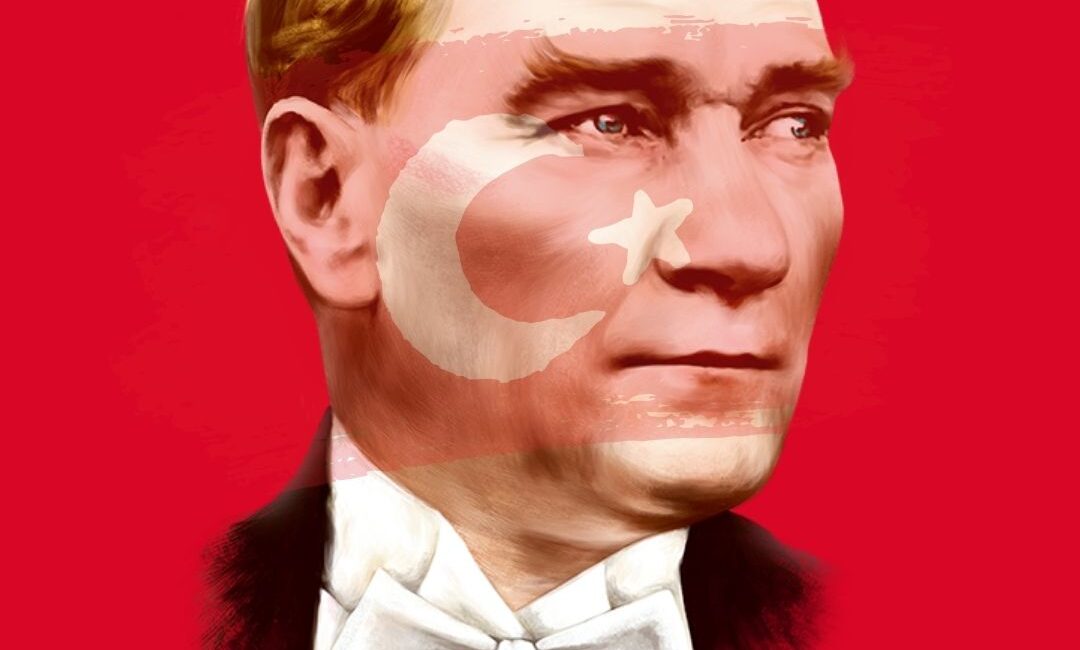 Atatürk çizimi. Atatürk’ün yüz bölgesinde Türk Bayrağı bulunmakta. Arka plan ise kırmızı.